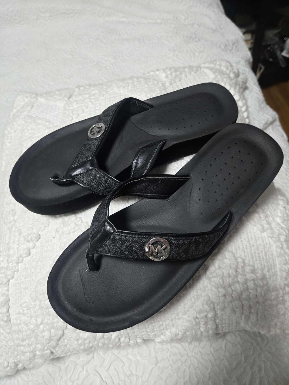 Michael Kors Black Women's Logo Thong Sandals with Silver Medallion
